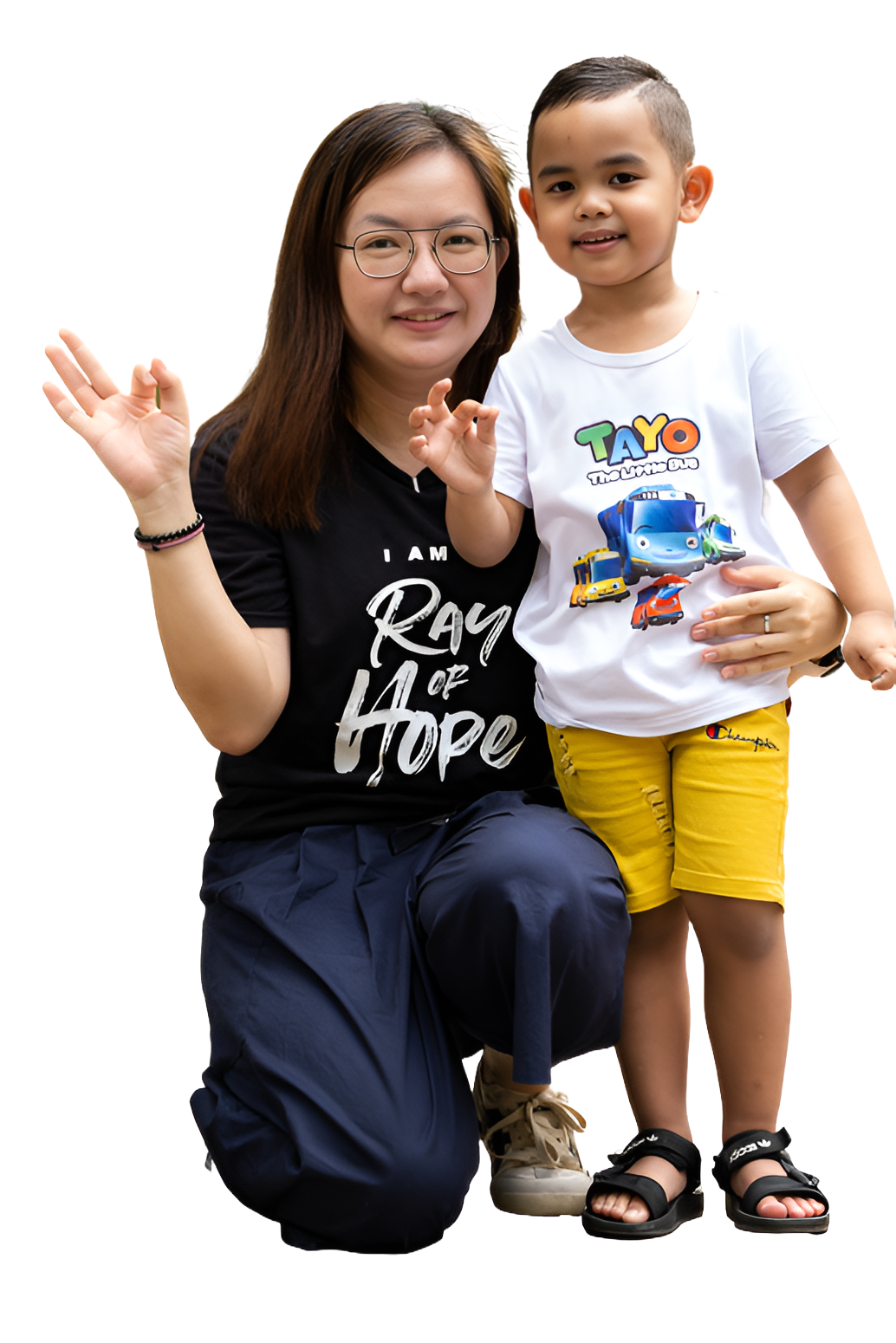 A Ray of Hope representative alongside the child they help